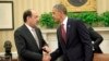 President Barack Obama shakes hands with Iraqi Prime Minister Nouri al-Maliki, Nov. 1, 2013, following their meeting in the Oval Office of the White House.