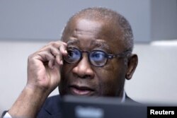 FILE - Former Ivory Coast President Laurent Gbagbo awaits the start of his trial at the International Criminal Court in The Hague, Netherlands, Jan. 28, 2016.