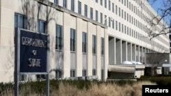 FILE - The State Department is pictured in Washington. Dissent has surfaced within the department over the U.S. policy of supporting Israel in its war against Hamas militants. 