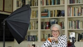 Senior influencer Sandra Sallin, 80, poses for a portrait at home, Friday, Aug. 20, 2021, in Los Angeles. Sallin is among a growing number of seniors making names for themselves on social media. (AP Photo/Chris Pizzello)