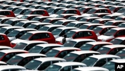 FILE: Hyundai Getz Cars are seen parked at the port for Export to Europe, in Chennai, India, Wednesday, May 23, 2007.