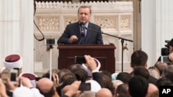 Turkish President Recep Tayyip Erdogan speaks at the inauguration of the Diyanet Center of America in Lanham, Maryland, April 2, 2016. 