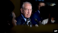 FILE - Senate Judiciary Committee Chairman Chuck Grassley, R-Iowa, speaks to reporters on Capitol Hill, Sept. 19, 2018.