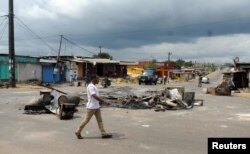 The streets of Libreville, Gabon, calmed down Friday but barricades remain following two days of deadly protest over presidential election results. Soldiers were deployed Friday.