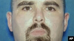 This undated photo provided by the FBI on Aug. 6, 2012 shows Wade Michael Page, a suspect in the Sunday, Aug. 5, 2012 Sikh temple shootings in Oak Creek, Wis. 