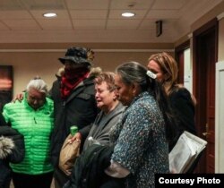 A tearful Barbara Charbonneau-Dahlen, with supporters and family members, reacting to a S.D. Senate vote to uphold current statute of limitations on sex abuse cases, February 13, 2018.