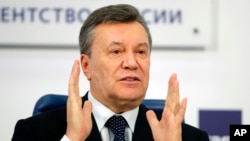 Ukraynanın keçmiş prezidenti Viktor Yanukoviç Moksvada mətbuat konfransında danışır, 2 mart, 2018.