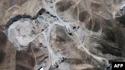 Satellite image shows a facility under construction inside a mountain located about 20 miles (32 kilometers) north northeast of Qom, Iran, September 26, 2009.