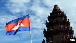 FILE - Cambodian flag flies at Independent Monument, Phnom Penh.