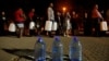 People queue to collect water from a spring in the Newlands suburb as fears over the city's water crisis grow in Cape Town, South Africa, Jan. 25, 2018.