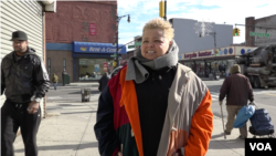Amanda Lugg walks through her Bedford-Stuyvesant neighborhood in the Brooklyn borough of New York, Dec. 2015. (R. Taylor/VOA)