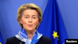 European Commission President Ursula von der Leyen gives a statement after the European Medicines Agency (EMA) gave the green light to European countries to start COVID-19 vaccinations in the coming days, following regulatory approval for the use of a sho
