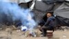 Migrants Battle Freezing Temperatures, Cold Shoulder at Hungarian Border