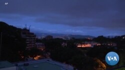 Electricity Returns to Parts of Venezuela after Outages Plunged Much of the Country into Darkness
