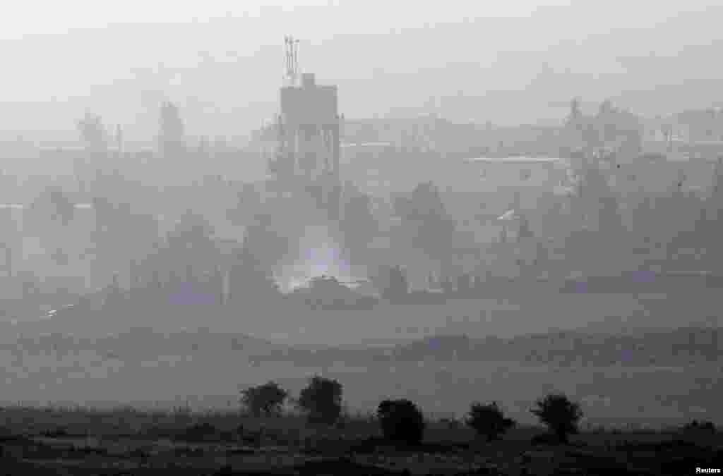 A Syrian army tank in a battle with rebel fighters in Syria near the Golan Heights, Sept. 1, 2014.