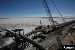 FILE - A view of a portion of an industrial plant in Llipi on the salt lake of Uyuni, Potosi, Bolivia, Oct. 7, 2018.