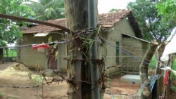 Illegally erected electric fence and traps set up to prevent wild elephants from entering human settlements are seen in Ashraf Nagar in Ampara district, about 210 kilometers (130 miles) east of the capital Colombo, Tuesday, Jan. 11, 2022. (AP Photo/Achala