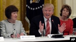 President Donald Trump, center, meets with Republican senators on health care in the White House, June 27, 2017. Seated with him, from left, are Sen. Susan Collins, R-Maine and Sen. Lisa Murkowski, R-Alaska.