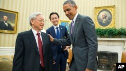 President Barack Obama, right, meets with Vietnamese Communist party secretary general Nguyen Phu Trong in the Oval Office of the White House, on Tuesday, July 7, 2015. (AP Photo/Evan Vucci)