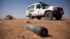 FILE - An unexploded ordnance is seen in North Darfur, March 27, 2011. 