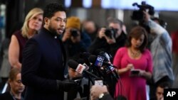 Actor Jussie Smollett talks to the media before leaving Cook County Court after his charges were dropped March 26, 2019, in Chicago. 