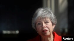 La primera ministra británica, Theresa May, hace una declaración en Londres, Gran Bretaña, el 24 de mayo de 2019.