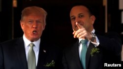 FILE - U.S. President Donald Trump welcomes Irish Prime Minister Leo Varadkar for a St. Patrick's Day reception at the White House in Washington, March 15, 2018.