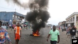 FILE - Congolese protest against President Joseph Kabila's refusal to step down from power in Kinshasa, Democratic Republic of Congo, Dec. 31, 2017. 