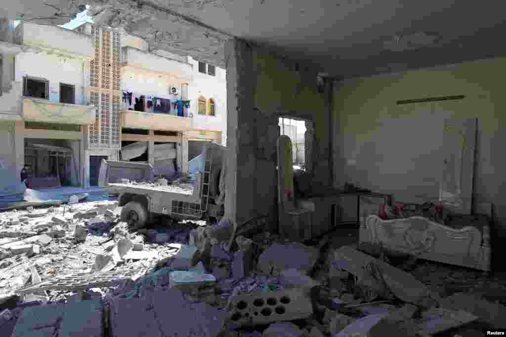 A general view shows damage at a site hit by airstrikes on Tuesday in the town of Khan Sheikhoun in rebel-held Idlib, April 5, 2017.