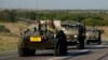 Putin Orders Russian Troops Away from Ukraine Border 