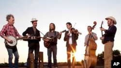 This undated image released by ATO Records shows members of Old Crow Medicine Show, from left, Kevin Hayes, Gill Landry, Chance McCoy, Ketch Secor, Morgan Jahnig, and Critter Fuqua.