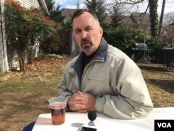 Patrick Pope, a vet from 28 years of service in the US Air Force and an Arlington voter, at Chanda Choun’s first meet and greet event at John Lyon VFW Post 3150 in Arlington, VA, Feb. 18, 2018. (Sophat Soeung/VOA)