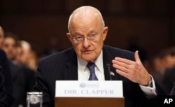 FILE - Director of the National Intelligence James Clapper testifies on Capitol Hill in Washington.