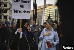 American Shi'ite Muslims march to the White House to protest against the Islamic State group, in Washington, D.C., Dec. 6, 2015.