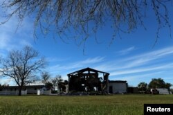 The structure of a mosque is seen one day after a fire at the Victoria Islamic Center inn Victoria, Texas, Jan. 29, 2017.