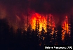 The Howe Ridge Fire burns at Glacier National Park, Montana.