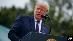 President Donald Trump speaks during an Armed Forces welcome ceremony for the new chairman of the Joint Chiefs of Staff, Gen. Mark Milley, Monday, Sept. 30, 2019, at Joint Base Myer-Henderson Hall, Va.