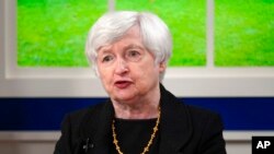 FILE - Treasury Secretary Janet Yellen speaks during a meeting in the South Court Auditorium on the White House campus, Oct. 6, 2021.