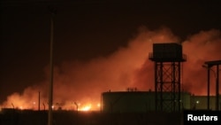 Fire engulfs the Yarmouk ammunition factory in Khartoum, Sudan, October 24, 2012.