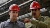 ARCHIVO: El exministro de Petróleo de Venezuela, Tareck El Aissami, junto al presidente Nicolás Maduro, en una foto del 18 de mayo de 2018.