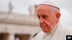 In this photo dated Wednesday, April 11, 2018, Pope Francis arrives in St.Peter's Square at the Vatican for his weekly general audience. An extraordinary letter published Wednesday April 11 said the Pope had made "grave mistakes" in dealing with an abuse crisis in Chile. (AP Photo/Andrew Medichini) 