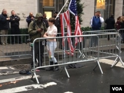 A protester in New York outside the Trump Tower