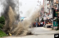 FILE - Nepalese Army's bomb disposal team detonate explosives during the local election in Bhaktapur, Nepal, May 14, 2017. Two explosive devices were planted across from a candidate's house. No one was injured.