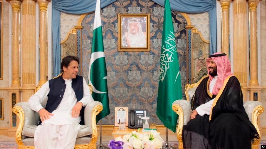 In this photo released by the state-run Saudi Press Agency, Pakistani Prime Minister Imran Khan, left, meets Saudi Crown Prince Mohammed bin Salman, Sept. 19, 2018, in Jiddah, Saudi Arabia. 