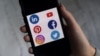 手機上顯示的社交媒體應用程序的標識。