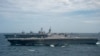 美國海軍公佈的照片顯示，英國皇家海軍“伊麗莎白女王”號航母、美國海軍“卡爾·文森”號航母與日本海上自衛隊“加賀”號直升機航母一道參加“海上合作夥伴關係演習”。(2021年10月17日)