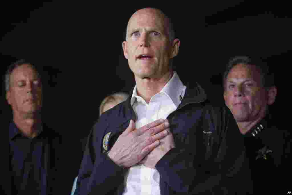 Florida Gov. Rick Scott speaks during a news conference near Marjory Stoneman Douglas High School in Parkland, where a former student is suspected of killing at least 17 people, Feb. 14, 2018.