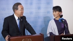UN Secretary General Ban Ki-Moon and Burma's opposition leader Aung San Suu Kyi speak at a joint media conference at the United Nations in New York, September 21, 2012.