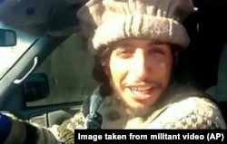 This undated image taken from a Militant Website shows Belgian Abdelhamid Abaaoud. A French official said Abaaoud is the suspected mastermind of the Paris attacks was also linked to thwarted train and church attacks.
