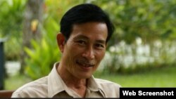 FILE - Prominent blogger Dieu Cay remains in jail in Vietnam.